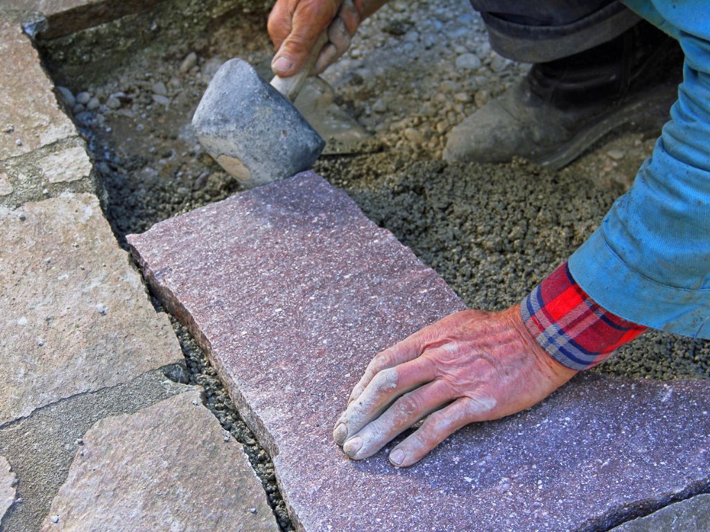 Man laying flatstone